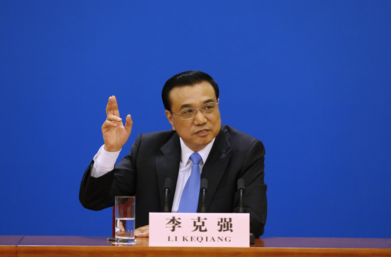 3月15日，國(guó)務(wù)院總理李克強(qiáng)在北京人民大會(huì)堂與中外記者見面，并回答記者提問。 新華社記者 沈伯韓 攝