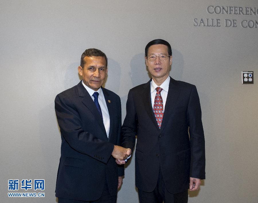 9月23日，出席聯(lián)合國氣候峰會的國家主席習(xí)近平特使、國務(wù)院副總理張高麗在紐約聯(lián)合國總部會見秘魯總統(tǒng)烏馬拉。 新華社記者 王曄 攝 