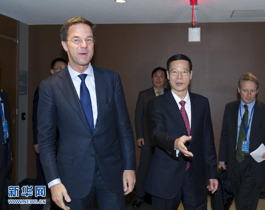 9月23日，出席聯(lián)合國氣候峰會的國家主席習(xí)近平特使、國務(wù)院副總理張高麗在紐約聯(lián)合國總部會見荷蘭首相呂特。 新華社記者 王曄 攝 