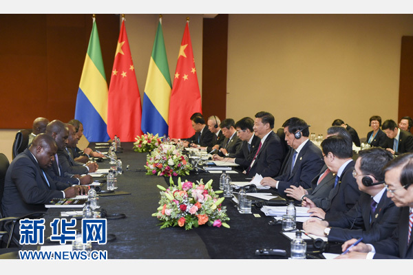 12月3日，國(guó)家主席習(xí)近平在約翰內(nèi)斯堡會(huì)見加蓬總統(tǒng)邦戈。新華社記者 謝環(huán)馳 攝 