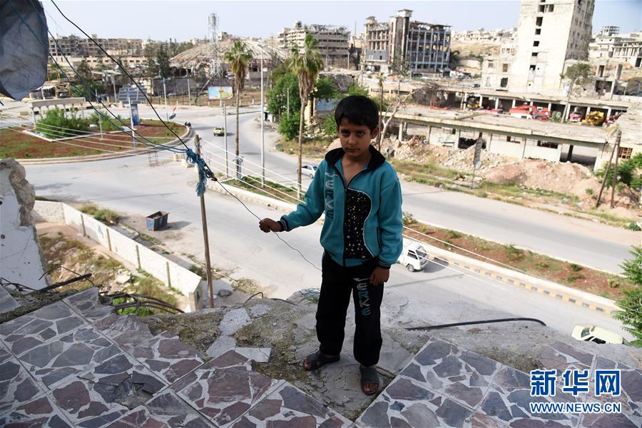 （國際&middot;圖文互動）（8）上學(xué)夢何處安放&mdash;&mdash;敘利亞女孩阿明娜的危樓生活