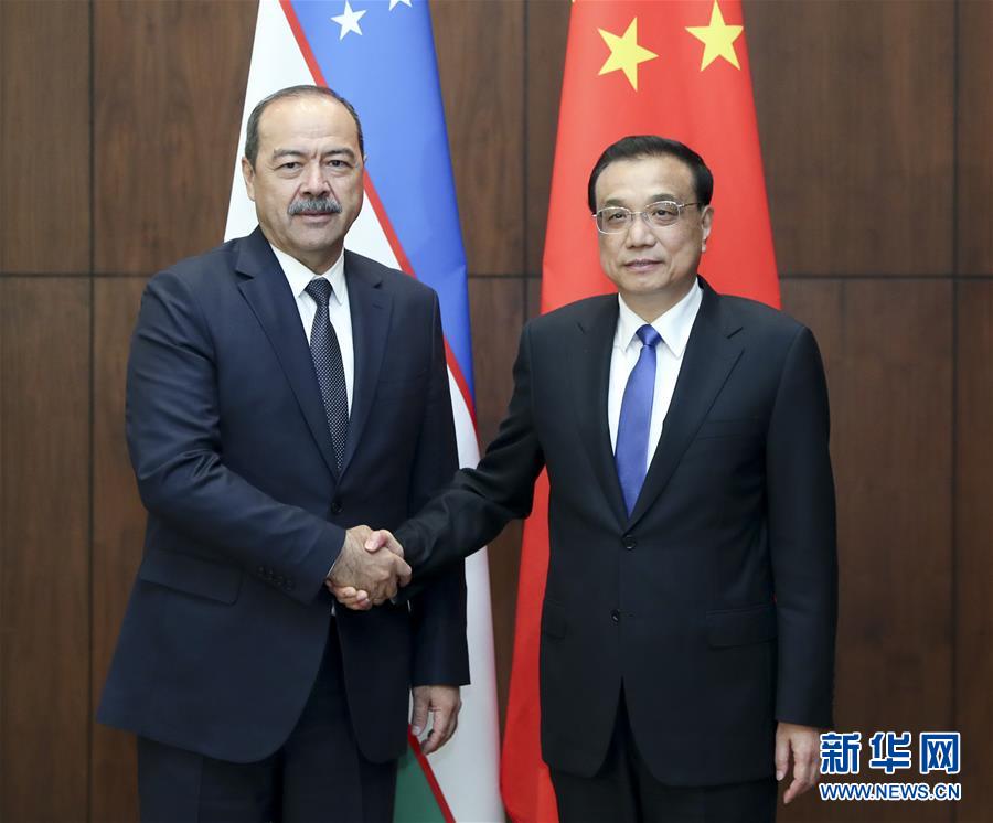 （時(shí)政）李克強(qiáng)會見烏茲別克斯坦總理阿里波夫